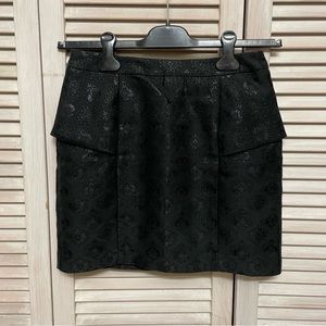 Shiny black mini skirt from Korea size small.